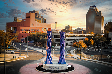 Artwork titled the “Door of Equality (La Puerta de Igualdad),” by Mexican artist Sebastian with the downtown skyline in the background.