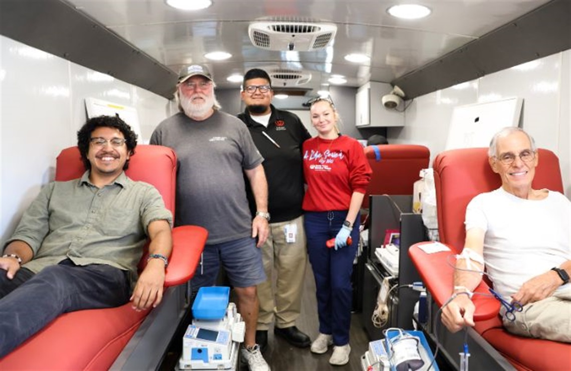 Councilmen Donating blood at a blood drive