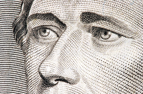 Close up of Alexander Hamilton from the 10 dollar bill.