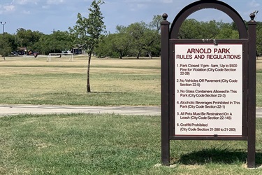 A sign on the Arnold Park rules and regulations