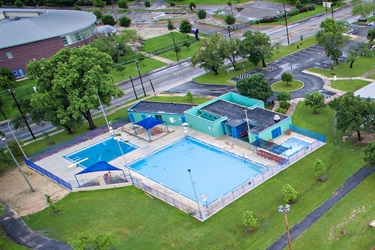 Overview from above of Cuellar Park featuring multiple swimming pools