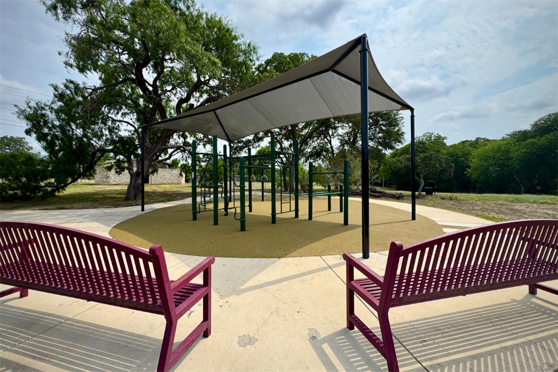 J Street Park fitness area and benches