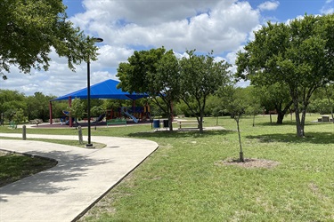 Kardon Park paved walkway, covered playground and grounds