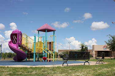Kingsborough Park multicolored playground and black benches