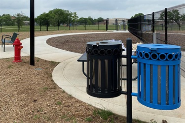 Kingsborough Park recycle and trash bins, paved walkway with fire hydrant