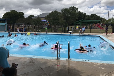 People swimming in a pool