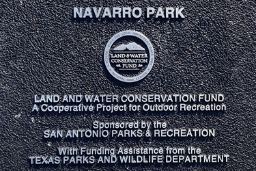 A plaque on a wall recognizing funding Assistance from the Texas Parks and Wildlife Department.