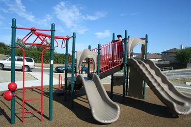 A colorful playground slide for kids to enjoy.