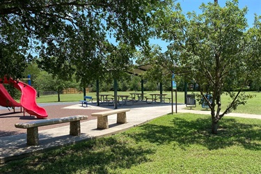 Benches in front of a playground