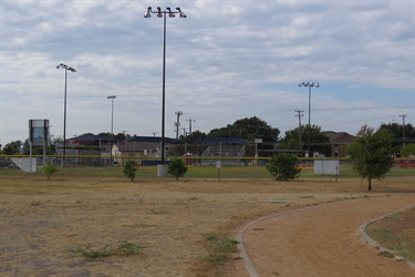 Baseball field with walking trail in foreground