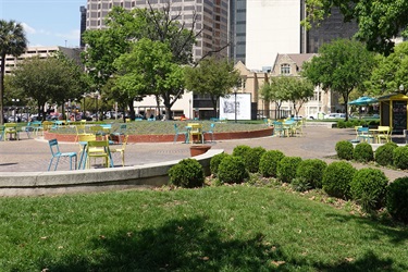 A park featuring tables and chairs