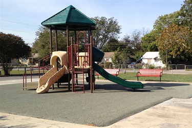 Playground with slide and play structure