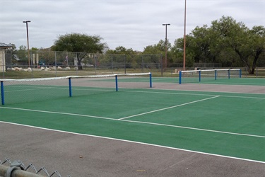 Two tennis courts side by side