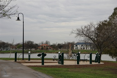 Fitness stations in front of lake
