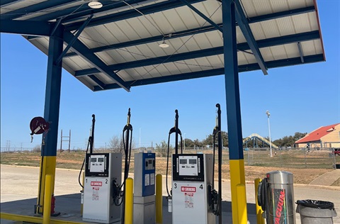 Fuel pumps under a canopy at a City fueling facility