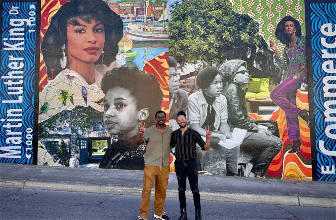 Jalen pointing at the sign