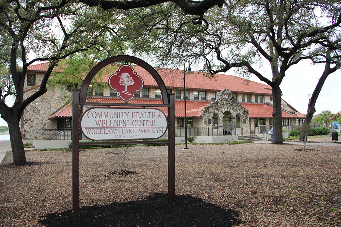 A sign in front of a building.