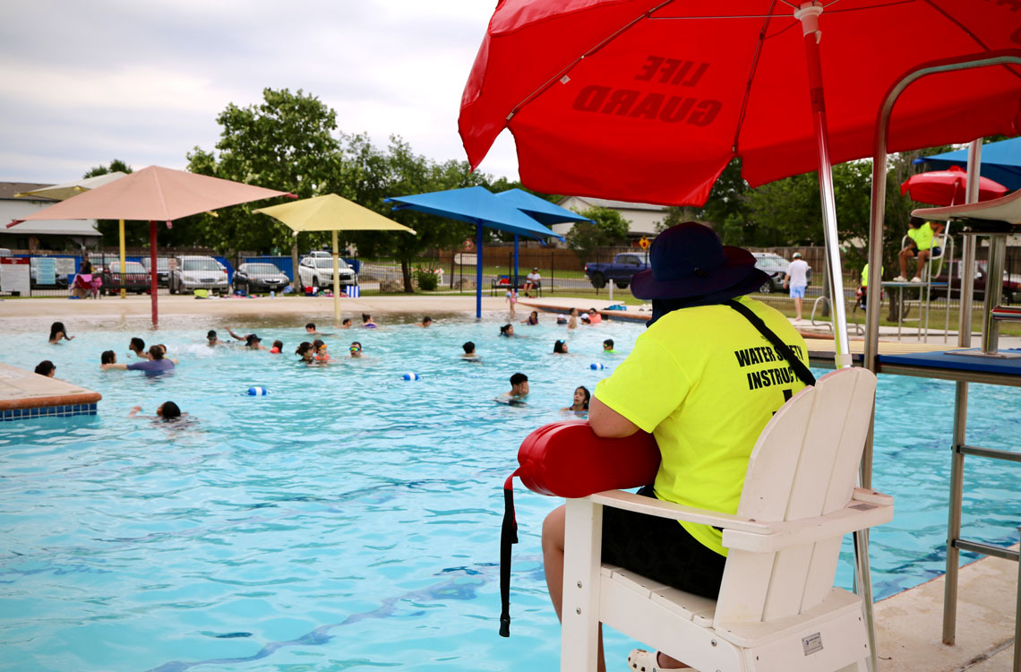 Lifeguard watching swimmers.
