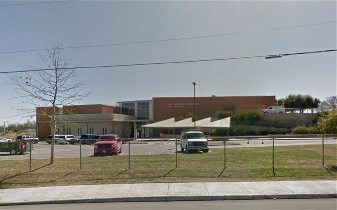 Elementary school behind parking lot