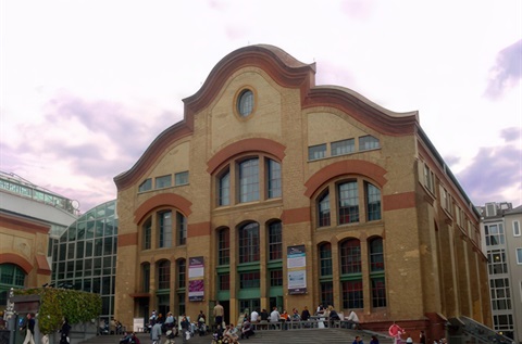Tall windowed building, the Centralstation in Darmstadt, Germany.